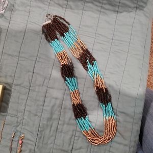 Beaded twist long necklace.